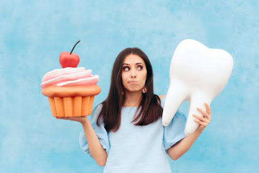 The Sweet Truth About Cavities: Exploring the Relationship between Sugar and Dental Health | Dentist in Laurel